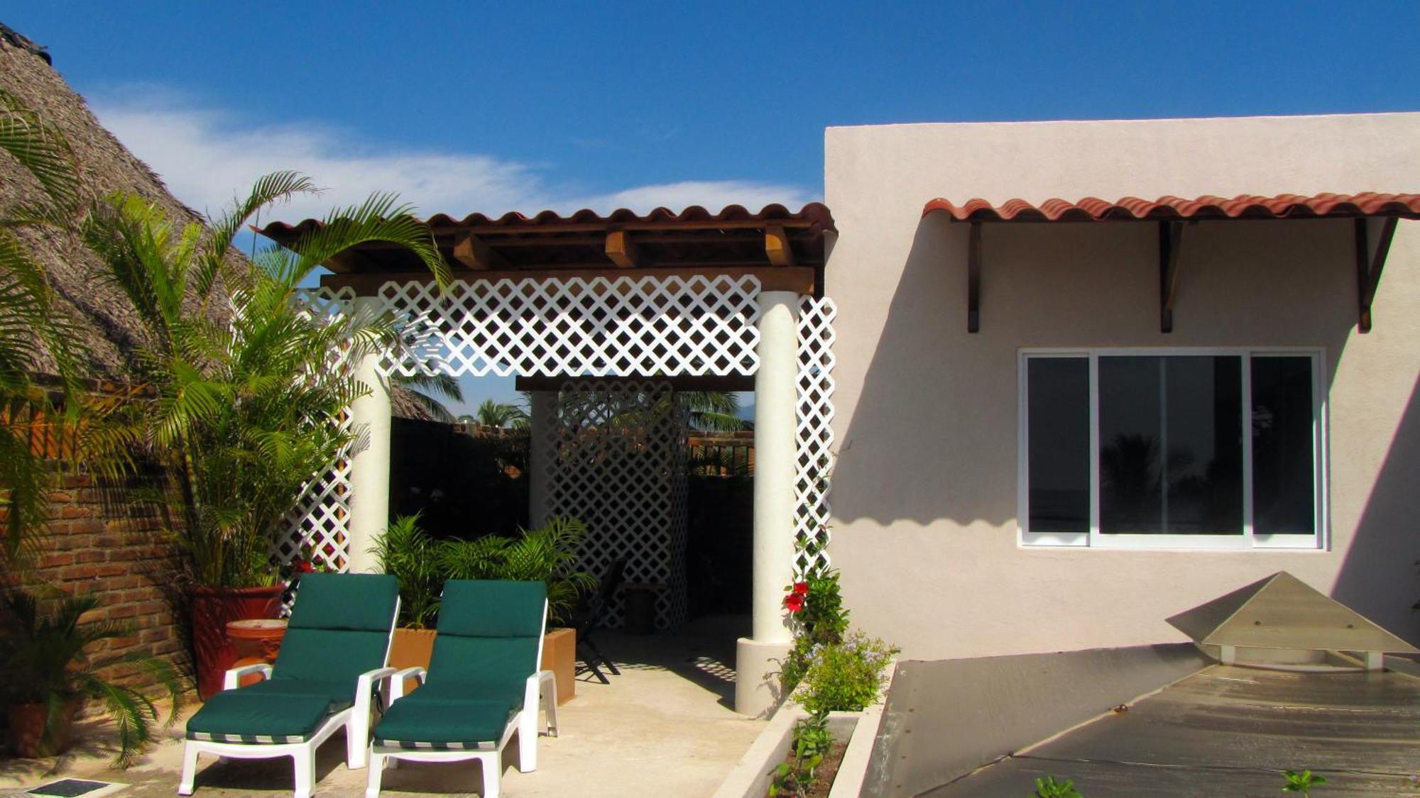 מלון סן פטריסיו מלקווה La Paloma Oceanfront Retreat חדר תמונה